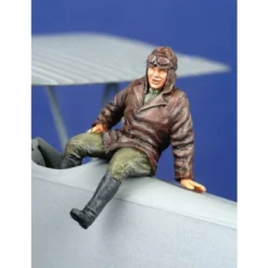 1 X WWI Pilot Seated Outside Aircraft (on Wing Or Fuselage)